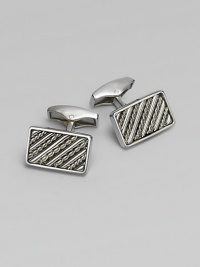 Rectangular sterling silver links are set with hand-twisted wire inlaid within silver bars. Sterling silver About ¼ X ½ Made in the United Kingdom 