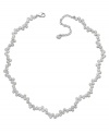 Swarovski's stunning rhodium-plated mixed metal necklace adds instant sophistication to any outfit, by day or night. Timeless, feminine, and graceful, the fluid silhouette sparkles in clear crystal pavé. Approximate length: 15 inches + 2-inch extender.