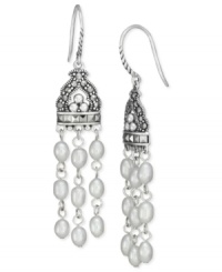 An elegant combination. Genevieve & Grace's drop earrings bring together cultured freshwater pearls (4-4-1/2 mm), sterling silver and marcasite for a statement that's truly stunning. Approximate drop: 2-1/4 inches. An elegant combination. Genevieve & Grace's drop earrings bring together cultured freshwater pearls (4-4-1/2 mm), sterling silver and marcasite for a statement that's truly stunning. Approximate drop: 2-1/4 inches.