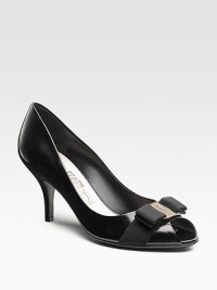Elegant leather style with signature bow detailing. Self-covered heel, 2¾ (70mm) Leather lining and sole Made in ItalyOUR FIT MODEL RECOMMENDS ordering true size.. Elegant leather style with signature bow detailing. Self-covered heel, 2¾ (70mm) Leather lining and sole Made in ItalyOUR FIT MODEL RECOMMENDS ordering true size..