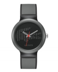 In the shadows. This unisex Goa by Lacoste watch is crafted of gray silicone strap with black piping and round gray plastic case. Black dial features striped iconic crocodile logo, white cut-out hour and minute hand, red second hand and gray text logo at six o'clock. Quartz movement. Water resistant to 30 meters. Two-year limited warranty. In the shadows. This unisex Goa by Lacoste watch is crafted of gray silicone strap with black piping and round gray plastic case. Black dial features striped iconic crocodile logo, white cut-out hour and minute hand, red second hand and gray text logo at six o'clock. Quartz movement. Water resistant to 30 meters. Two-year limited warranty.