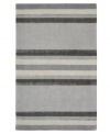 Linear designs are accented with exotic faux silk to create a timeless palette in the Sahara area rug from Calvin Klein. Crafted by skilled artisans in India, it features generously thick wool and viscose fibers woven to create remarkable strength and impeccable elegance.