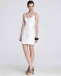 An opulently beaded neckline punctuates this vintage-inspired yet sleekly modern Shoshanna dress. An opulently beaded neckline punctuates this vintage-inspired yet sleekly modern Shoshanna dress.