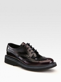 Leather wing-tip style with rubber sole and colored micro detail.Leather upperLeather liningRubber soleMade in Italy Leather wing-tip style with rubber sole and colored micro detail.Leather upperLeather liningRubber soleMade in Italy