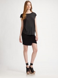 The perfect layering piece - smooth fabric with a contemporary rounded hem. BoatneckShort cap sleevesU-shaped hem60% cotton/40% polyesterDry cleanMade in USAModel shown is 5'10 (177cm) wearing US size Small. The perfect layering piece - smooth fabric with a contemporary rounded hem. BoatneckShort cap sleevesU-shaped hem60% cotton/40% polyesterDry cleanMade in USAModel shown is 5'10 (177cm) wearing US size Small.