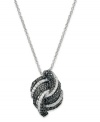 Wrapped in Love™ specializes in styles that will win your heart. This stunning pendant features overlapping swirls of round-cut black diamonds (3/8 ct. t.w.) and white diamonds (1/3 ct. t.w.). Necklace comes in a polished sterling silver setting. Approximate length: 18 inches. Approximate drop length: 3/4 inch. Approximate drop width: 1/2 inch.
