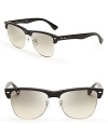 These Ray-Ban sunglasses exude classic cool, with mixed media frames surrounding smoky lenses.