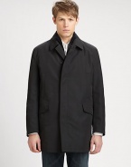 Water-resistant microfiber styled with a breathable thermal liner that buttons in and out for three looks in one.Point collarButton frontSlash pocketsFlap pocketsRemovable linerAbout 34 from shoulder to hemMicro-polyesterDry cleanImported