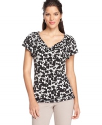 An abstract black & white print adds a graphic appeal to this otherwise feminine Alfani top -- a spring staple! An abstract black & white print adds a graphic appeal to this otherwise feminine Alfani top -- a spring staple!