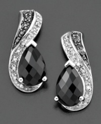 Add a touch of fabulous to your look with these stylish earrings featuring onyx (9 by 6 mm) and round-cut diamonds (1/10 ct. t.w.) set in sterling silver. Approximate drop: 3/4 inches. Add a touch of fabulous to your look with these stylish earrings featuring onyx (9 by 6 mm) and round-cut diamonds (1/10 ct. t.w.) set in sterling silver. Approximate drop: 3/4 inches.