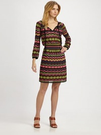 A fab knit with a signature wave print that features an ultra-feminine neckline and a body-flattering, elasticized waistband.Self-tie detail at v-necklineLong sleevesElasticized waistSolid trimFully linedAbout 35 from shoulder to hem79% cotton/19% viscose/2% linenDry cleanImported Model shown is 5'10½ (179cm) wearing US size 4. A fab knit with a signature wave print that features an ultra-feminine neckline and a body-flattering, elasticized waistband.Self-tie detail at v-necklineLong sleevesElasticized waistSolid trimFully linedAbout 35 from shoulder to hem79% cotton/19% viscose/2% linenDry cleanImported Model shown is 5'10½ (179cm) wearing US size 4.