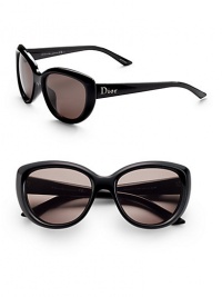 Modern cat's-eye frames updated for a versatile sophisticated look. Available in shiny black with brown grey lens.Optyl Dior logo temple 100% UV protection Made in Italy 