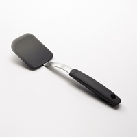 OXO silicone cookie spatula. This silicone cookie spatula is ideal for lifting pancakes or cookies from a cookie sheet without breaking them. It is made of silicone bonded to flexible stainless steel. It is safe for nonstick cookware and is heat resistant to 600°F. OXO silicone cookie spatula. This silicone cookie spatula is ideal for lifting pancakes or cookies from a cookie sheet without breaking them. It is made of silicone bonded to flexible stainless steel. It is safe for nonstick cookware and is heat resistant to 600°F.