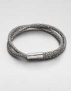 A double strand of fine Italian leather in a unique stingray pattern is offset by a sterling silver cylindrical clasp.LeatherSterling silverAbout 2½ diam.Made in the United Kingdom