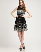 A striking design featuring unbelievably gorgeous flower embellishments and a beloved, universally flattering silhouette.Round neckSleevelessFull, gathered skirtScalloped hemBack zipperAbout 26 from natural waistCottonDry cleanMade in Italy Model shown is 5'10 (177cm) wearing US size 4. OUR FIT MODEL RECOMMENDS ordering true size. 