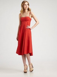 A simply flattering poplin design, complemented by adjustable straps, a sweeping skirt and an alluring cutout back.Seamed, sweetheart necklineAdjustable strapsPrincess seamsSlash pocketsCutout back detailBack zipperAbout 32 from natural waist96% cotton/4% polyurethaneDry cleanMade in USA of imported fabric Model shown is 5'10½ (179cm) wearing US size 4. A simply flattering poplin design, complemented by adjustable straps, a sweeping skirt and an alluring cutout back.Seamed, sweetheart necklineAdjustable strapsPrincess seamsSlash pocketsCutout back detailBack zipperAbout 32 from natural waist96% cotton/4% polyurethaneDry cleanMade in USA of imported fabric Model shown is 5'10½ (179cm) wearing US size 4.