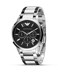 A classic look with a sleek profile, this Armani watch features all analog display - including second and date - and a comfortable steel link bracelet. A classic look with a sleek profile, this Armani watch features all analog display - including second and date - and a comfortable steel link bracelet.