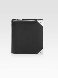 Rich, sumptuous leather adorned with polished hardware in a compact zip-around design.Zip-around closureOne inside open pocketOne flap and snap pocketSix credit card slotsLeather lining4½W X 5H X 3/4DImported Rich, sumptuous leather adorned with polished hardware in a compact zip-around design.Zip-around closureOne inside open pocketOne flap and snap pocketSix credit card slotsLeather lining4½W X 5H X 3/4DImported