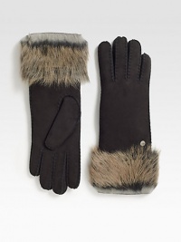 A soft, dyed shearling cuff and supple suede upper help make this glamorous style a cold weather essential.Length, about 12.5Professional leather dry cleanerImportedFur origin: Spain