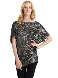 THE LOOKAllover sequinsDolman sleevesBack cutoutPullover styleTHE FITAbout 29 from shoulder to hemTHE MATERIALPolyesterFully linedCARE & ORIGINDry cleanImportedModel shown is 5'10½ (179cm) wearing US size Small. THE LOOKAllover sequinsDolman sleevesBack cutoutPullover styleTHE FITAbout 29 from shoulder to hemTHE MATERIALPolyesterFully linedCARE & ORIGINDry cleanImportedModel shown is 5'10½ (179cm) wearing US size Small.