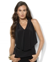 Lauren Ralph Lauren's fluid silk blouse is crafted in a sleeveless silhouette with an elegant ruffle at the front. Lauren Ralph Lauren's fluid silk blouse is crafted in a sleeveless silhouette with an elegant ruffle at the front.