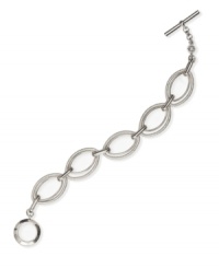 Simple luxury in chic, oval links. Monet design features a trendy toggle bracelet in silver tone mixed metal. Approximate length: 7-1/2 inches. Simple luxury in chic, oval links. Monet design features a trendy toggle bracelet in silver tone mixed metal. Approximate length: 7-1/2 inches.