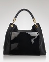 Every girl needs a not-so-basic day bag, and this leather Z Spoke Zac Posen hobo tops our list with its just-right slouch. It's cool for weekends and chic for workdays.