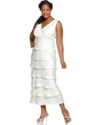 Brilliant for bridal and other elevated occasions, R&M Richards' plus size dress is sparkling perfection with its beaded empire waist and long, tiered silhouette. (Clearance) Brilliant for bridal and other elevated occasions, R&M Richards' plus size dress is sparkling perfection with its beaded empire waist and long, tiered silhouette. (Clearance)