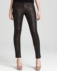 Tap into your inner rockstar in these shiny snakeskin printed Sanctuary Jeans--sleek with a bronze-colored sheen, they always stand out in a crowd. Tap into your inner rockstar in these shiny snakeskin printed Sanctuary Jeans--sleek with a bronze-colored sheen, they always stand out in a crowd.