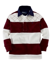 A classic bold stripe accents a long-sleeved rugby for heritage style. A classic bold stripe accents a long-sleeved rugby for heritage style.