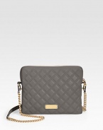 Slip your iPad® into this demure bag crafted from luxe quilted leather and finished with a chic chain strap.Leather and chain shoulder strap, 18 dropTop zip closureOne inside zip pocketRemovable snap-on insertLinen lining10¼W X 8¼H X 1¼DImportedPlease note: iPad® not included