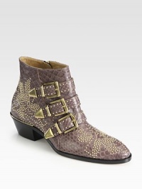 Edgy metal studs freshen this on-trend ankle boot, impeccably crafted in Italy of luxurious genuine python. Stacked heel, 2 (50mm)Python upper with metal studsSide zip and adjustable buckle strapsLeather lining and solePadded insoleMade in Italy Edgy metal studs freshen this on-trend ankle boot, impeccably crafted in Italy of luxurious genuine python. Stacked heel, 2 (50mm)Python upper with metal studsSide zip and adjustable buckle strapsLeather lining and solePadded insoleMade in Italy