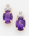Couple cool amethyst with glittering diamonds to make her February birthday - or any event - special. Multifaceted oval-cut amethyst are crowned with round-cut diamond accents and set in 14k gold. For pierced ears only.