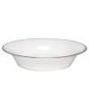 Dress up any veggies or sides with this fine china serving dish. From innovative designer Monique Lhullier, it features a platinum-edged tiered scallop pattern on creamy white.