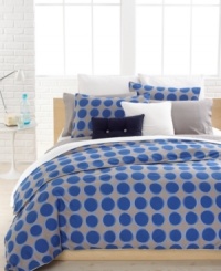 Sporty style meets preppy polish! This Sevres duvet cover set from Lacoste dresses your bed with a landscape of mesmerizing circles. White piped edges complete the modern look. Button closure.