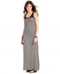 A solid colorblock through the back & straps adds a modern edge to this striped DKNYC maxi dress -- perfect for relaxed summer style! A solid colorblock through the back & straps adds a modern edge to this striped DKNYC maxi dress -- perfect for relaxed summer style!