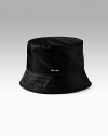 Lightweight nylon with stitched brim. Nylon lining Dry clean Made in Italy 