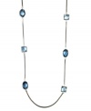 This enchanting station necklace by AK Anne Klein adds the perfect last layer to your daily look. With plastic aqua accents, it's crafted in imitation rhodium-plated mixed metal. Approximate length: 36 inches.
