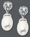 Sweet sophistication. Round-cut white topaz (7-3/4 ct. t.w.) and a cultured freshwater pearl (7 mm x 10 mm) form an elegant shape on these sterling silver drop earrings. Approximate drop: 3/4 inch.