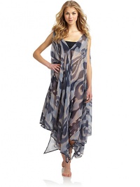 THE LOOKExotic inspired print on sheer, flowy chiffonOne dress, so many ways to wear itBelted, one-shoulder, crisscross or bring in 2 points on the hem to cinch the waistIncludes tag with styling optionsV-neckAsymmetrical hemLong side slitsTHE FITAbout 45 from shoulder to longest point of hemTHE MATERIALPolyesterCARE & ORIGINHand washMade in USAPlease note: One size fits most. THE LOOKExotic inspired print on sheer, flowy chiffonOne dress, so many ways to wear itBelted, one-shoulder, crisscross or bring in 2 points on the hem to cinch the waistIncludes tag with styling optionsV-neckAsymmetrical hemLong side slitsTHE FITAbout 45 from shoulder to longest point of hemTHE MATERIALPolyesterCARE & ORIGINHand washMade in USAPlease note: One size fits most.