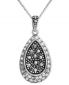 Genevieve & Grace knows glam. This shimmering teardrop pendant combines round-cut crystals and marcasite in a sterling silver setting. Approximate length: 18 inches. Approximate drop: 1 inch.