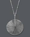 Reinvent the wheel. Studio Silver's large circular pendant revamps a classic design with a textured surface and delicate beaded chain. Crafted in sterling silver. Approximate length: 18 inches. Approximate drop: 1-1/2 inches.