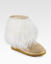 It's all about the soft, sheepskin cuff in this new suede style.Shaft, 5 Leg circumference, 14½ Suede and shearling upper Pull-on style Shearling lining Padded insole Rubber sole ImportedOUR FIT MODEL RECOMMENDS ordering true whole size; ½ sizes should order the next whole size up. 