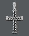 Express your faith in Celtic-inspired design. This remarkable cross pendant features a unique, braided design. Crafted in stainless steel with matching ball chain. Approximate length: 24 inches. Approximate drop width: 1-1/2 inches. Approximate drop length: 2-1/10 inches.