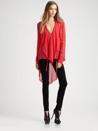 Soft ruffles cascade down the front of this airy silk top, finished with a dramatic hi-lo hem.V-neck with tie closureSingle button closureGathered sleevesAbout 24 from shoulder to hemSilkDry cleanImportedModel shown is 5'9 (175cm) wearing US size Small. Soft ruffles cascade down the front of this airy silk top, finished with a dramatic hi-lo hem.V-neck with tie closureSingle button closureGathered sleevesAbout 24 from shoulder to hemSilkDry cleanImportedModel shown is 5'9 (175cm) wearing US size Small.