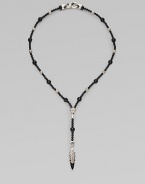 A handsomely crafted sterling silver pendant hangs from a strand of onyx beads. Sterling silver Onxy Pendant, about 1½ long Necklace, about 22 long Imported 