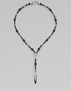 A handsomely crafted sterling silver pendant hangs from a strand of onyx beads. Sterling silver Onxy Pendant, about 1½ long Necklace, about 22 long Imported 