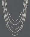 Polish your look in picturesque style. Necklace features five graduated strands of cultured freshwater pearls (6-10 mm) strung on delicate sterling silver strands of varying size and shape. Approximate lengths: 26, 29, 32, 35, and 38 inches.