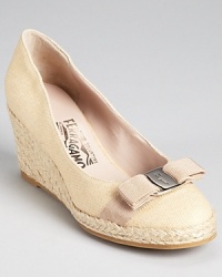 These Salvatore Ferragamo espadrille wedges exude timeless chic in three colors of canvas. These Salvatore Ferragamo espadrille wedges exude timeless chic in three colors of canvas.
