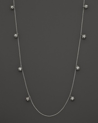 Inspired by Zen philosophy, this intricately detailed sterling silver necklace from Paul Morelli softly jingles with eight meditation bells. Inspired by Zen philosophy, this intricately detailed sterling silver necklace from Paul Morelli softly jingles with eight meditation bells.